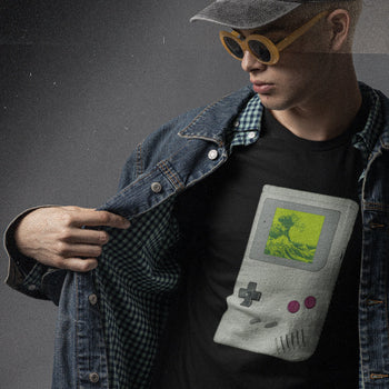 Guy wearing tshirt of a Nintendo Game Boy with The Great Wave Off Kanagawa on its screen.