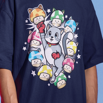 Gamer wearing cat themed gaming tshirt of a cute cat punching mushrooms for 9-up.