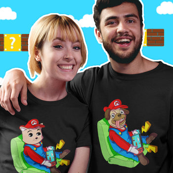 Couple wearing tshirts with Cat and Dog wearing Mario Costume and playing Nintendo Switch gaming console.